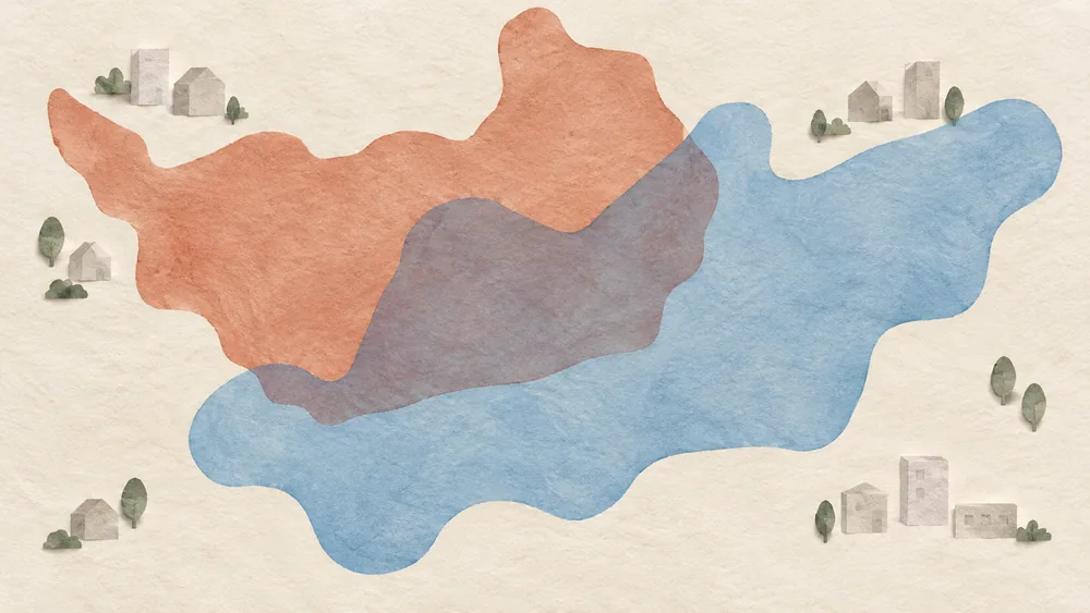 Two overlapping abstract paper shapes beside small generic building models.